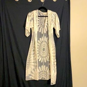 Rebellion white beach cover